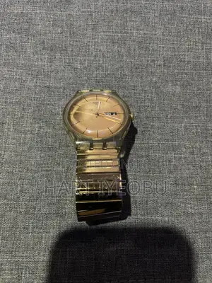 Swatch Gold Watch