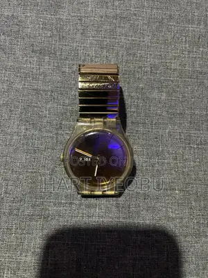 Swatch Gold Watch