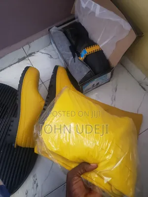Brand New, Safey Boot, Rainboot And Rain Coat For Sale.