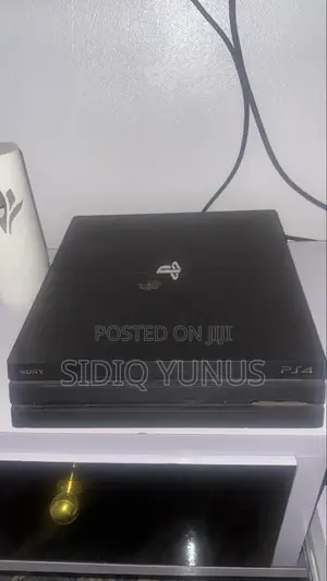 Playstation 4 Pro With 5 Games