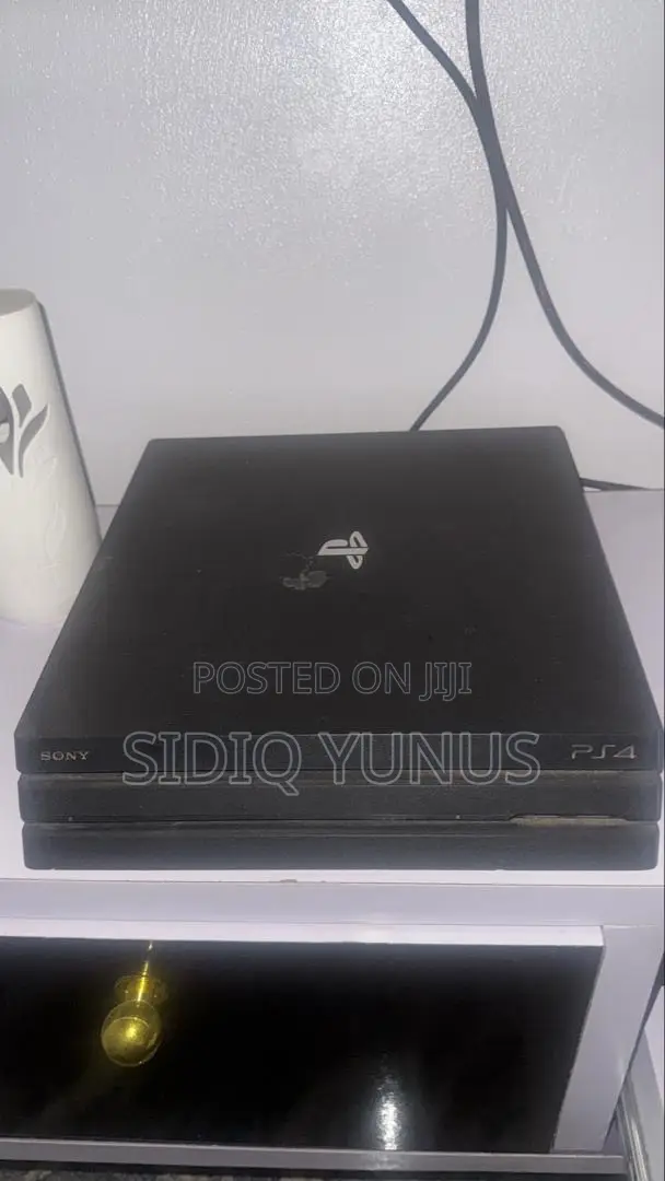 Playstation 4 Pro With 5 Games