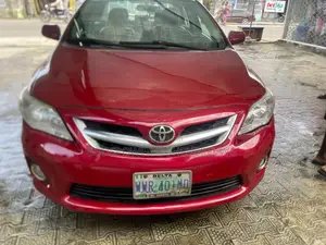 Toyota Corolla Base 4dr Sedan (1.8L 4cyl 5M) 2010 Red