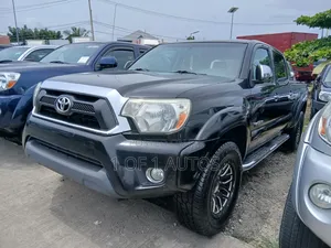 Toyota Tacoma 4dr Access Cab 4WD 6.1 ft. SB (2.7L 4cyl 4A) 2014 Gray
