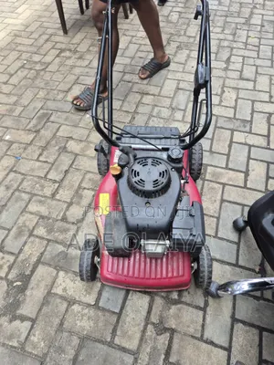 Red Petrol-Powered Rotary Lawnmower