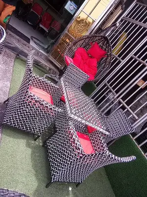 This Black and White Wicker Outdoor Furniture Set