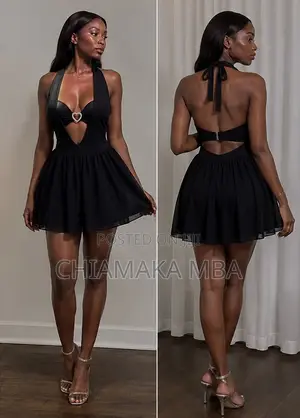 Elegant Black Halter Plunging Neck Mini Dress With Metallic Bra Detail