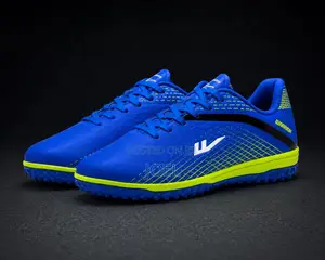 Warrior Blue and Neon Green Turf Soccer Shoes