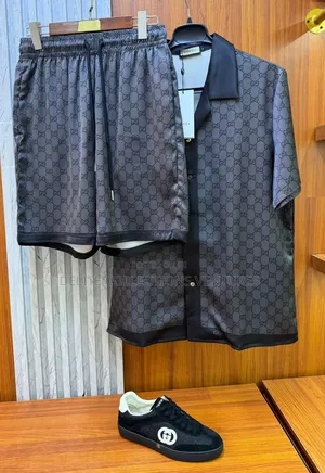 Luxury Update  
Gucci Printed Silk Twill Shirt Short.