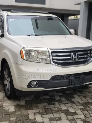 Honda Pilot Touring w/RES/Navi 4WD (3.5L 6cyl 5A) 2013 Off white