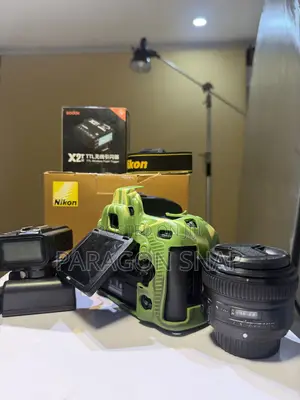 Nikon D750, 50mm Nikon Lens, X2 Trigger, Single Battery Charger.