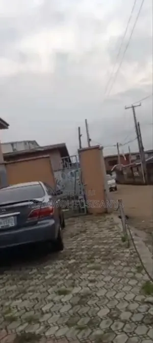 A Commercial Property Sitting on a Cornerpiece Plot on Akowonjo Rd