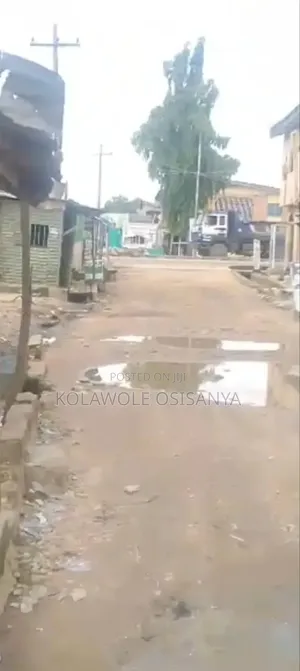 Commercial Quarter Plot Measuring 20ft By 120ft On Ikotun Igando Rd