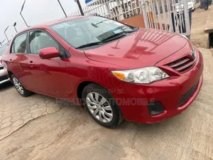Toyota Corolla LE 4dr Sedan (1.8L 4cyl 4A) 2013 Red
