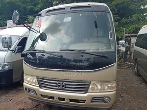 Toyota Coaster 2018 Gold