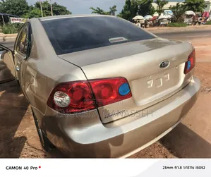 Kia Optima EX Sedan FWD (2.7L 6cyl 5A) 2010 Brown