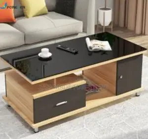 A Very Neat Center Table With Glass Top