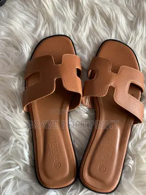 Female Hermes Slide