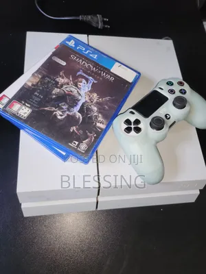 Fairly Used Ps4 With One Pad and Three Games