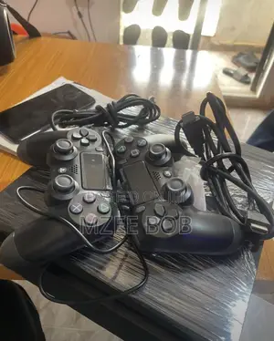 Play Station 4 Far Complete With Two Pads
