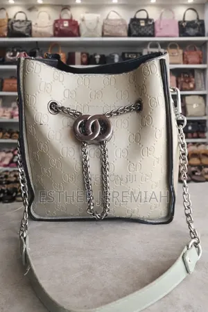 Cream Monogram Bucket Crossbody Bag With Chain Detail
