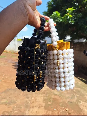 Beaded Bags, Designed Berrets and Beaded Necklaces.