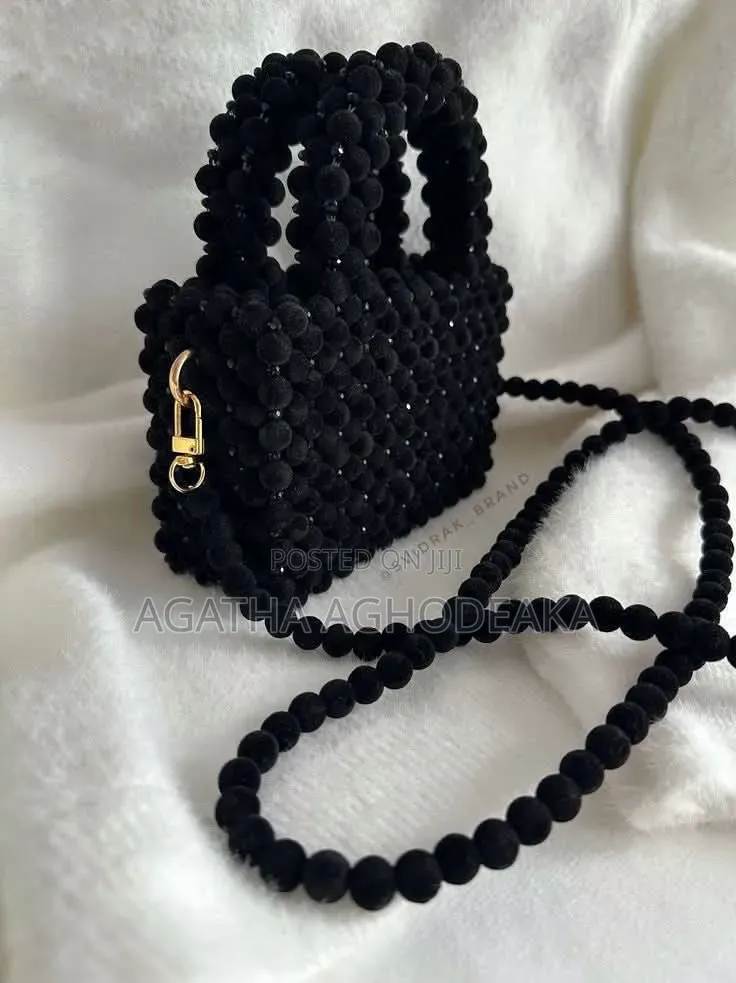 Beaded Bags, Designed Berrets and Beaded Necklaces.