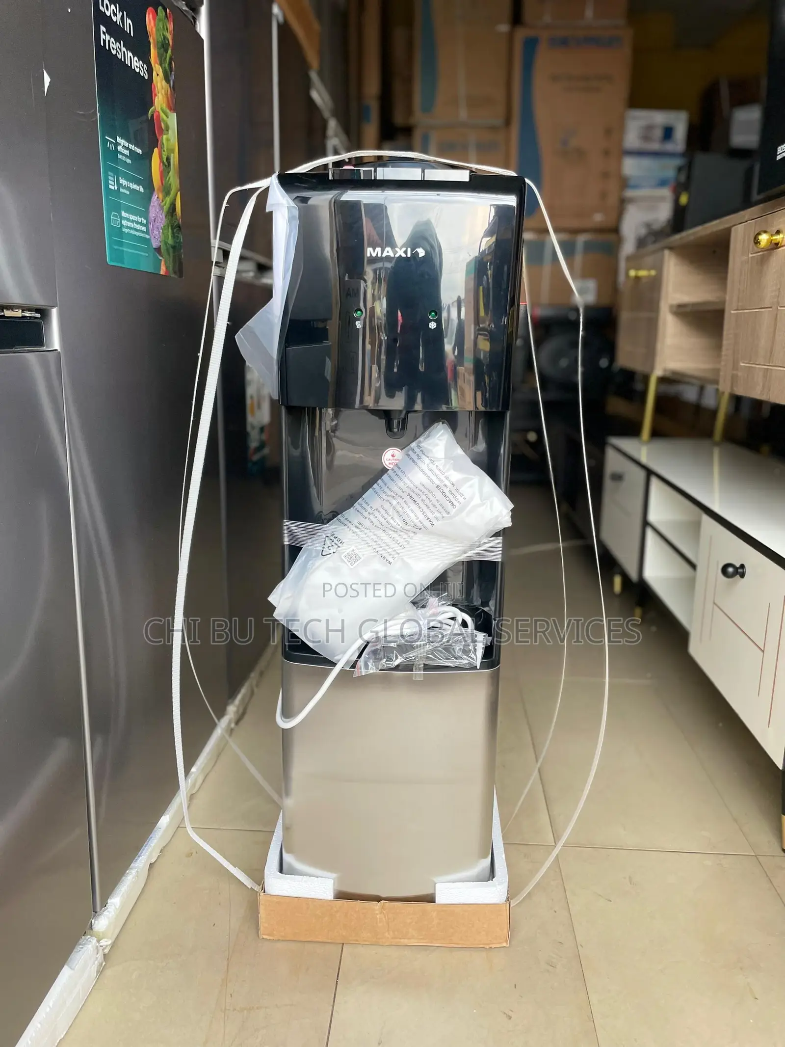 Brand New Maxi Bottom-Loading Water Dispenser Featuring Hot, Cold.