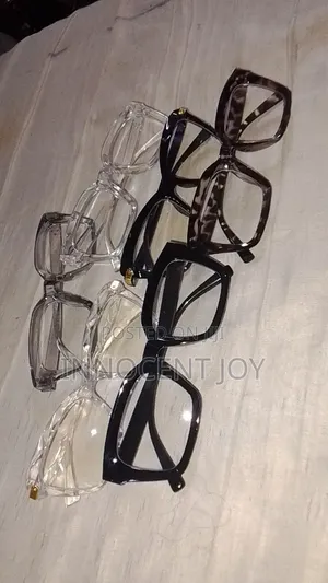 Glasses, Postcard, and Hand Sock