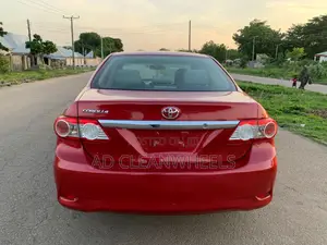 Toyota Corolla L 4dr Sedan (1.8L 4cyl 5M) 2013 Red