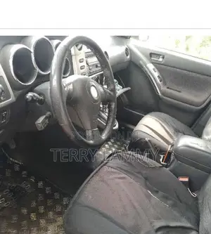 Toyota Matrix XR Hatchback FWD (1.8L 4cyl 4A) 2004 Gold