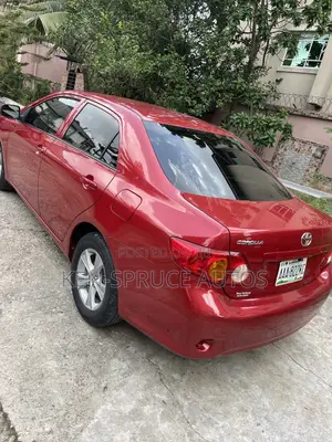 Toyota Corolla LE 4dr Sedan (1.8L 4cyl 4A) 2010 Red