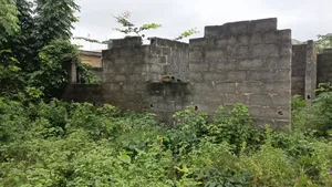 A Plot of Land With Uncompleted 3 Bedroom Up to Window Level