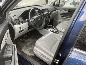 Honda Pilot Touring 4dr SUV 4WD (3.5L 6cyl 9A) 2016 Blue
