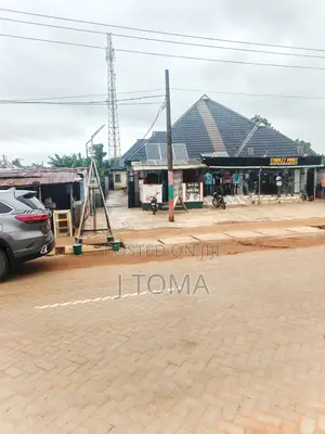 Commercial Property Facing Road With a Working Supermarket Lounge