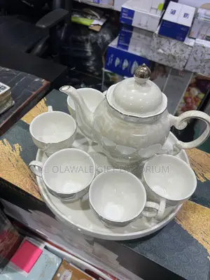 Rotating Tea Cup, Jug and Tray