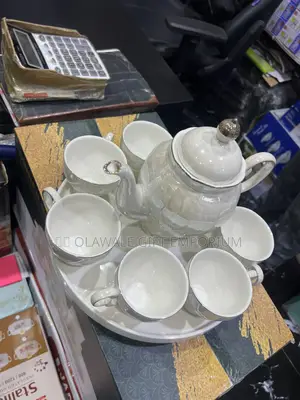 Rotating Tea Cup, Jug and Tray
