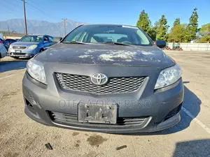 Toyota Corolla Base 4dr Sedan (1.8L 4cyl 5M) 2010 Black