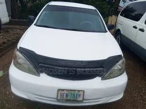 Toyota Camry LE 4dr Sedan (2.4L 4cyl 5M) 2003 White