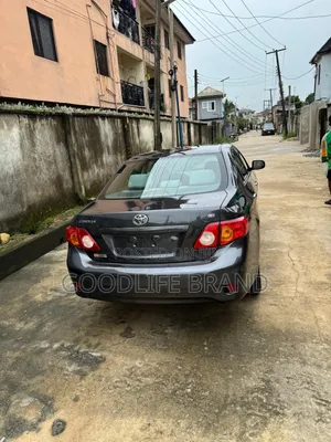 Toyota Corolla Base 4dr Sedan (1.8L 4cyl 5M) 2010 Gray