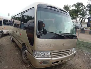 Toyota Coaster 2017 Gold