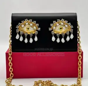 Schiaparelli Eyes Alligator Clutch