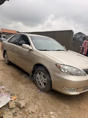 Toyota Camry LE 4dr Sedan (2.4L 4cyl 5A) 2006 Gold