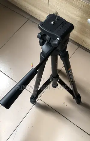 An Original Vintage Tripod Stand
