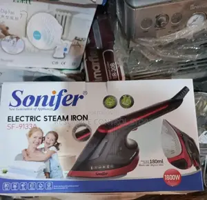 This Is a Sonifer Sf-9054 Portable Steam Iron Featuring a Orange and B