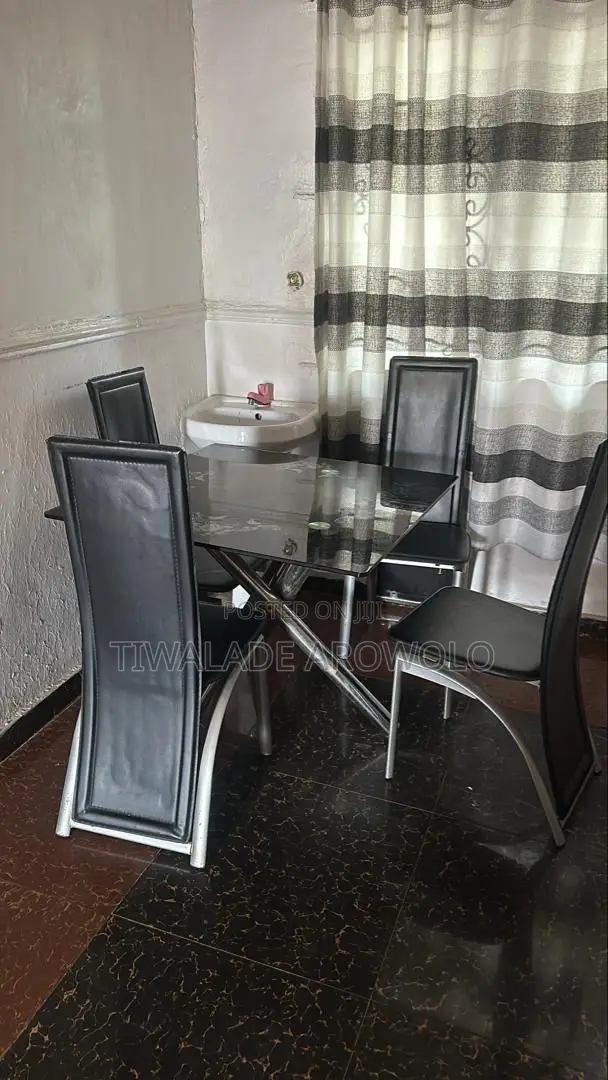4 Setter Glass Top Dinning Set