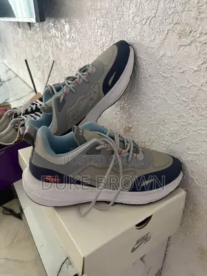 Neatly Used Lacoste Sneakers – Original (Size 44)