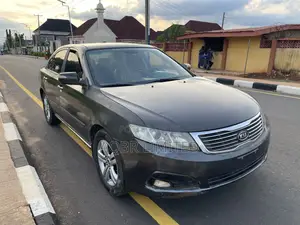 Kia Optima EX Sedan FWD (2.4L 4cyl 5A) 2010 Brown