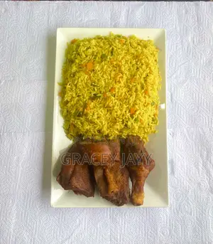 Delicious Party Jollof Rice With Chicken .