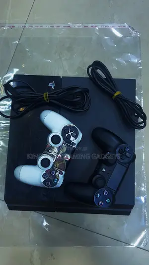 London Used Ps4 Standard Comes With 2 Controllers and 10 Games