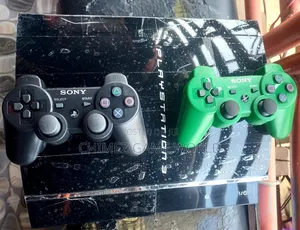 Ps3 Uk Used With 2 Pads and Games Installed
